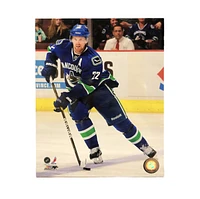 NHL 8x10 Player Photograph Puck Daniel Sedin Canucks