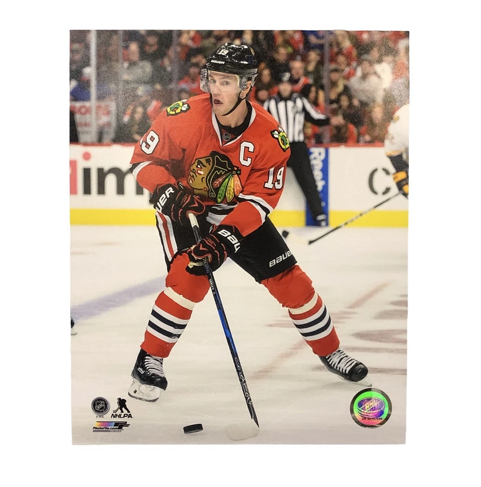 NHL 8x10 Player Photograph Puck Jonathan Toews Blackhawks