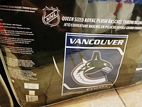 NHL Queen Sized Royal Plush Blanket Canucks