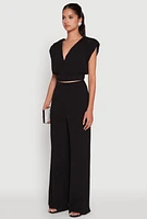 Womens Chic Crepe Knit Blouse with Padded Shoulders and Tie Back, Black, Size S