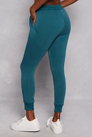 Womens Queene Graphic Fleece Drawstring Joggers, Green, Size M