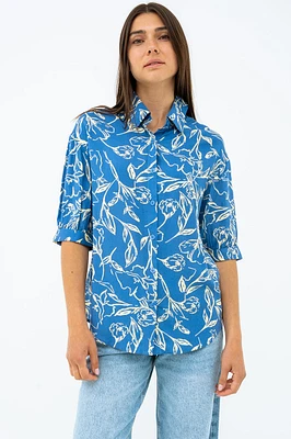 La blouse imprimée manches ballon bouton assorti
