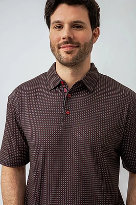Le polo imprimé all-over abstrait