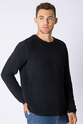 Le chandail en tricot texturé