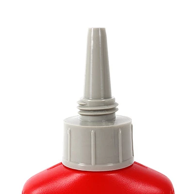 Bottle of multipurpose glue