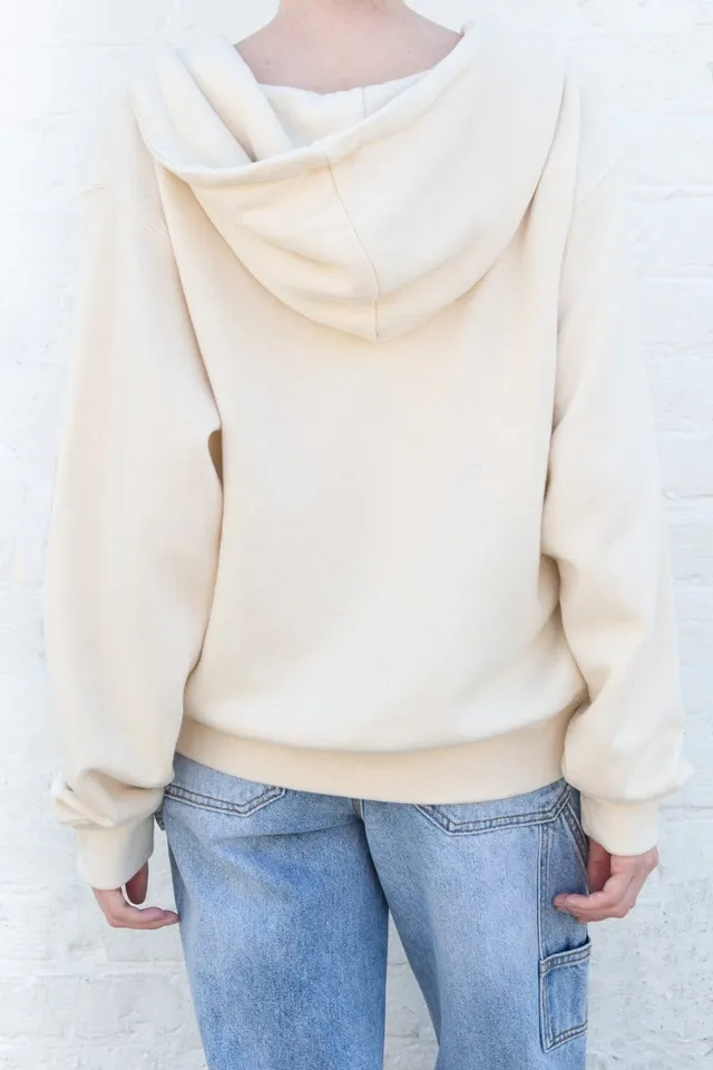 Brandy Melville, Tops, Brandy Melville Cream Oversized Christy Brooklyn  Hoodie