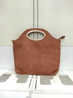 Vertical Lined Hand bag