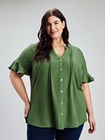 Blouse semi-ajustée à manches courtes avec boutons