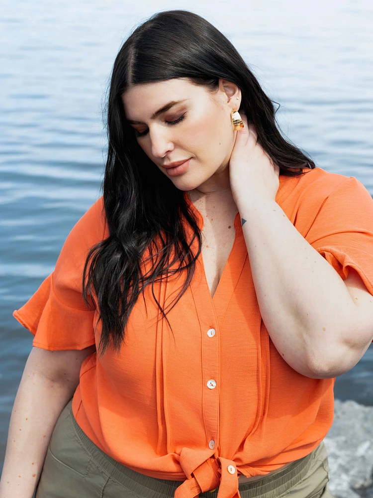 Blouse semi-ajustée à manches courtes avec boutons