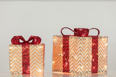Set of 2 Rattan Gift boxes (8" & 10") - Gold/Silver Zig Zag & Red Bow