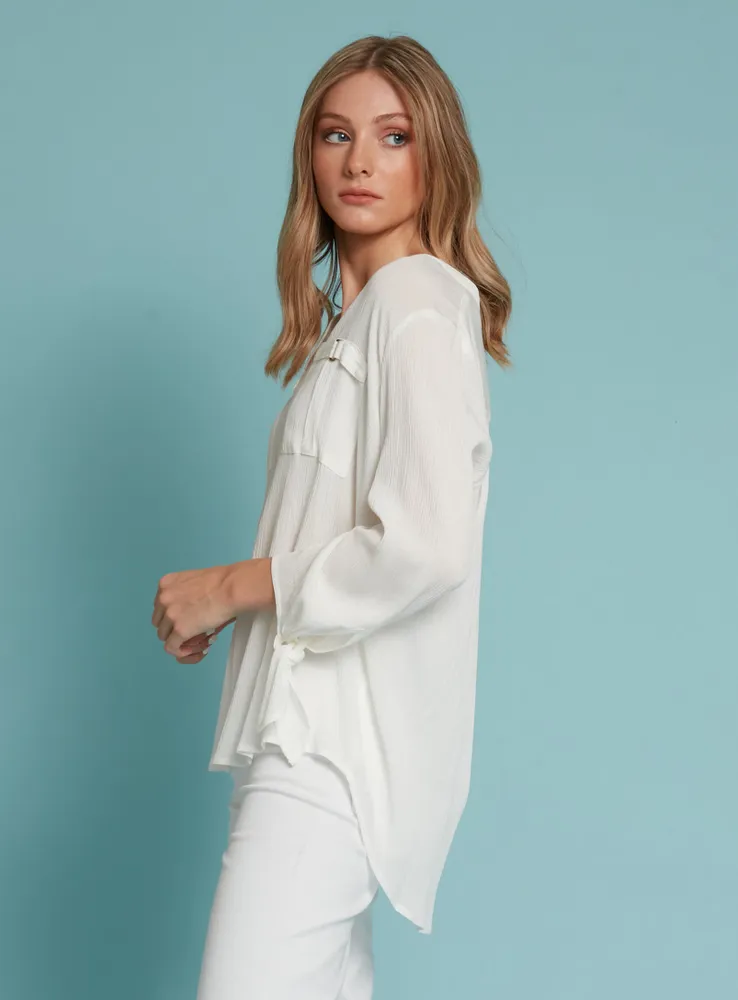 RILA | Semi-sheer white blouse