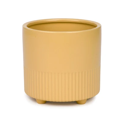 Cache-pot jaune sur pieds