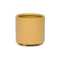 Cache-pot jaune sur pieds
