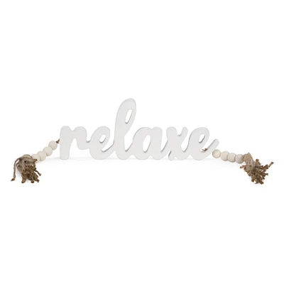 Mot "Relaxe" blanc avec billes