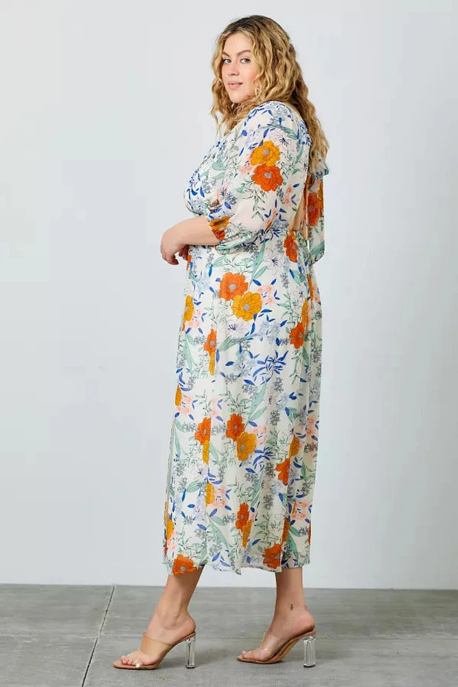 Robe longue fleurie en mousseline nouée au dos