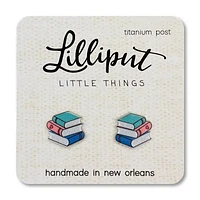 Pendientes de pila de libros