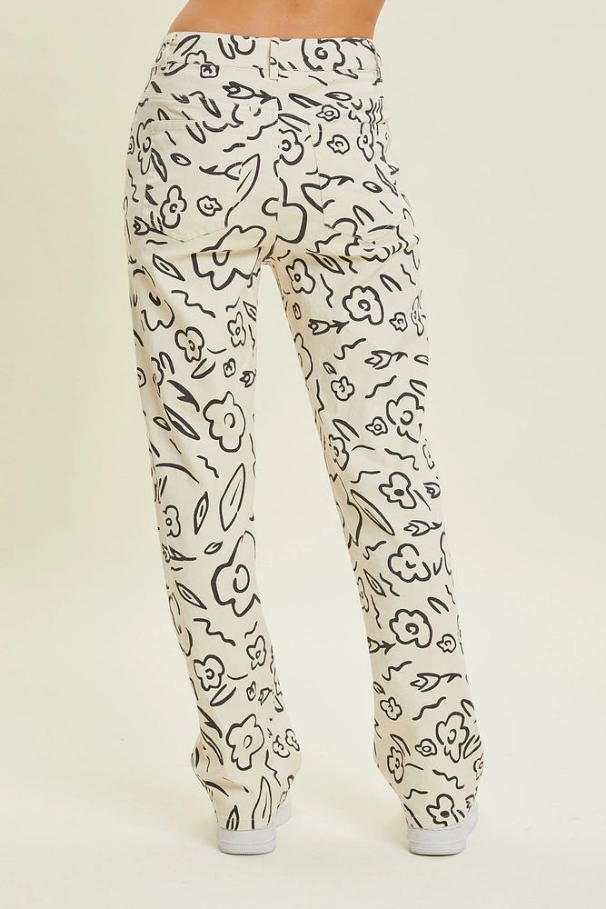 Pantalones de mezclilla elásticos con estampado floral