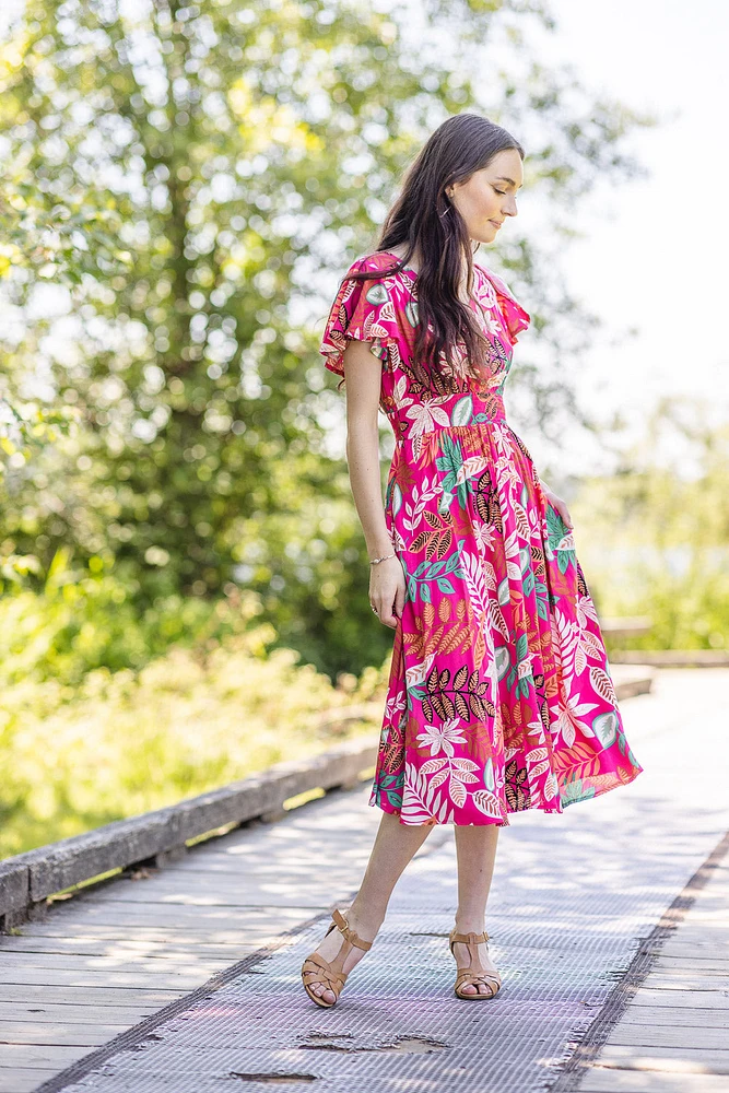 Vestido midi con estampado tropical y bolsillos