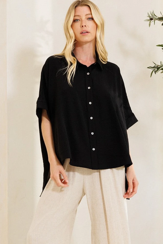 Chemise oversize unie boutonnée sur le devant