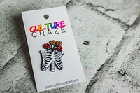 RIBCAGE FLOWERS PIN