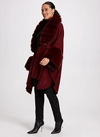 Poncho à encolure et poignets en fausse fourrure
