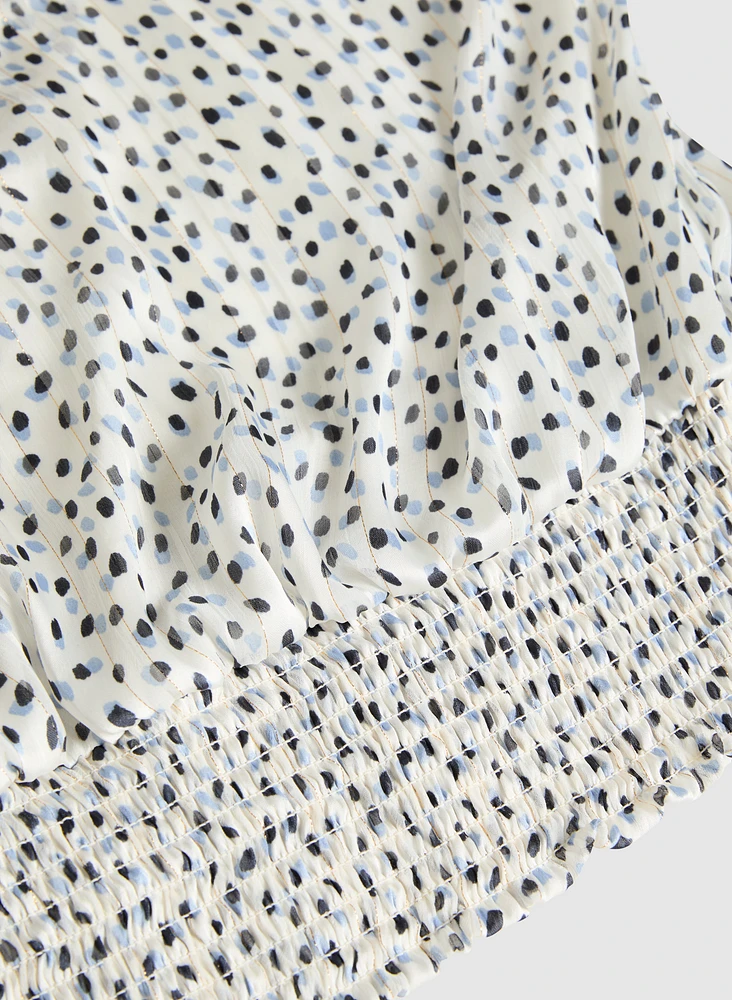 Blouse à pois abstraits