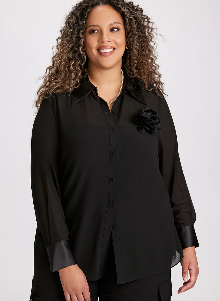 Blouse boutonnée à rosette en satin