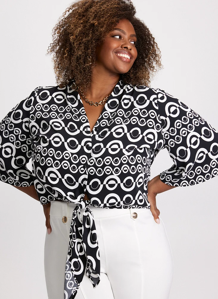 Blouse nouée à motif géométrique