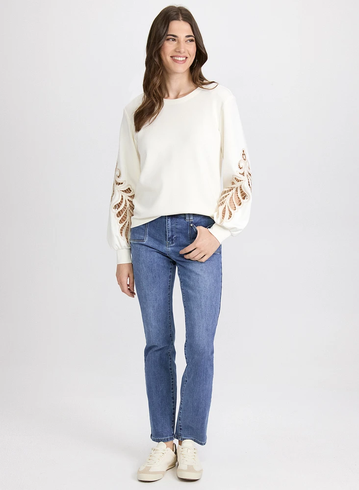 Haut à broderies ajourées
