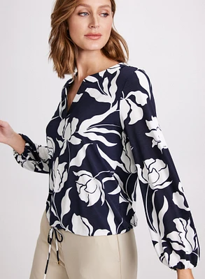 Blouse à motif floral et taille nouée