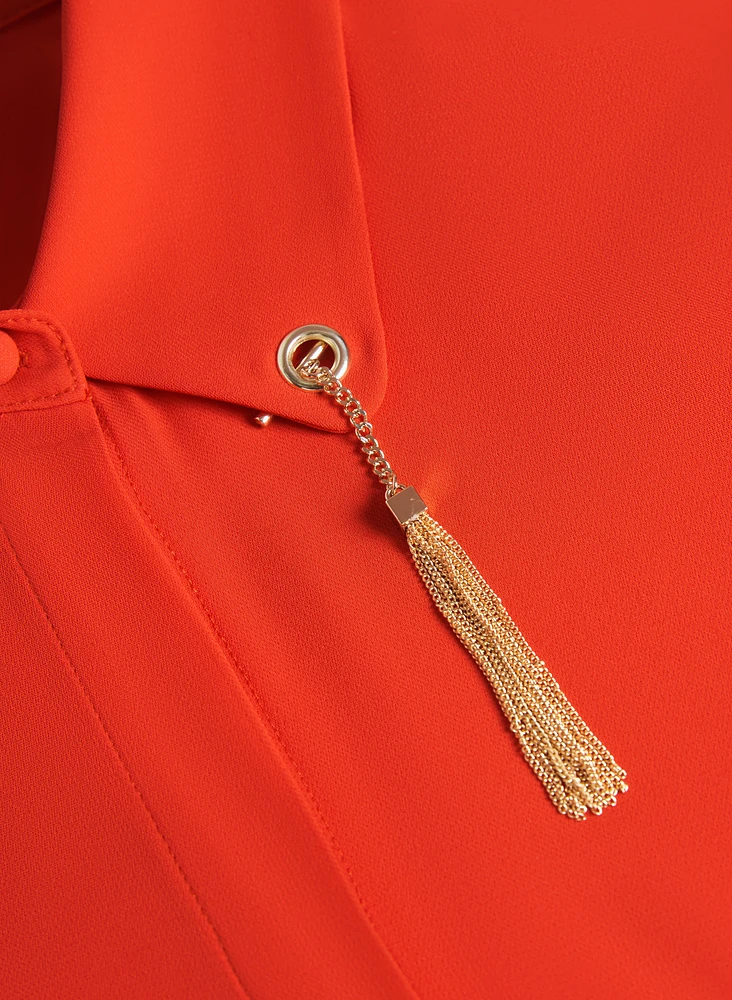 Blouse à pampilles métalliques