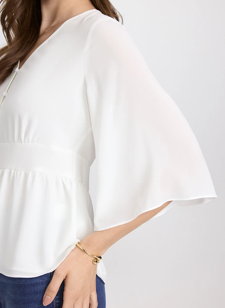 Blouse boutonnée à manches évasées