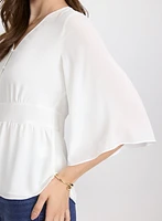 Blouse boutonnée à manches évasées