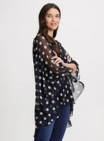 Blouse poncho à pois