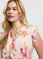 Blouse fleurie à volants