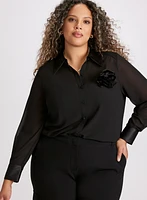 Blouse boutonnée à rosette en satin