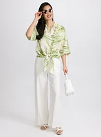 Blouse tropicale à ourlet noué