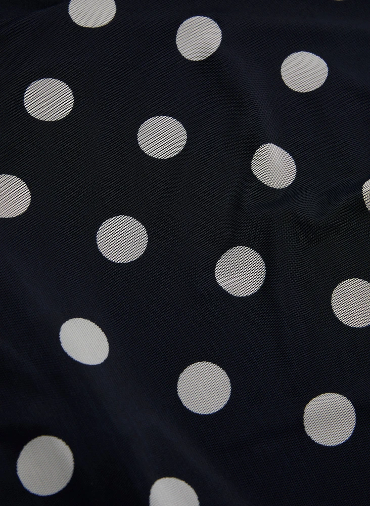 Haut transparent à pois