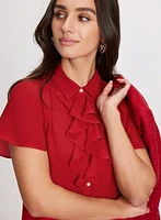 Blouse à manches courtes volantées