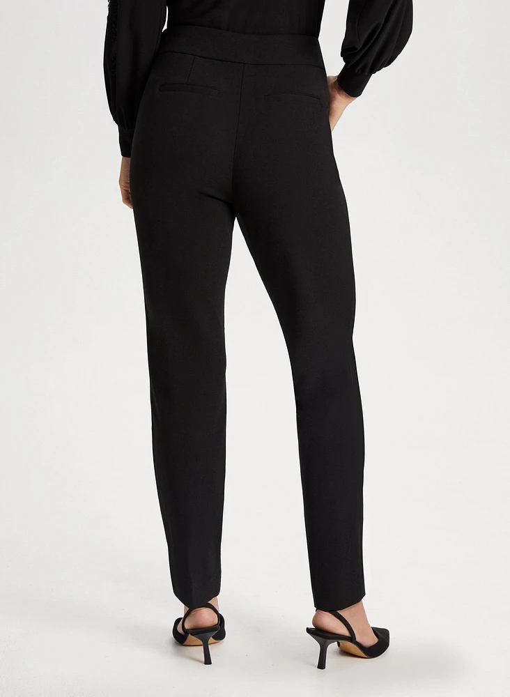 Pantalon jambe étroite à détail boutons