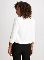 Veste à col tailleur et manches roulées