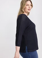 Pull en tricot ajouré
