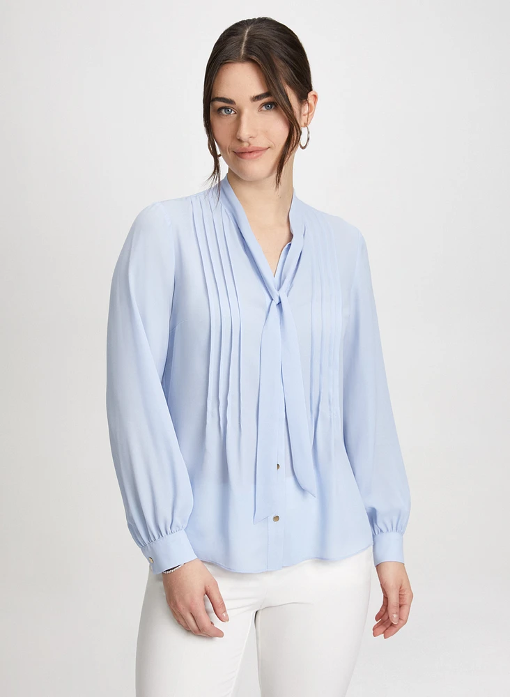 Blouse à plis avec ruban nouer