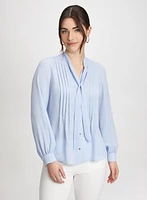 Blouse à plis avec ruban nouer