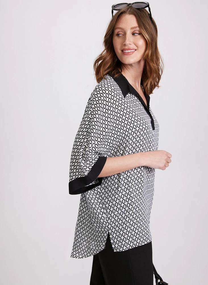 Blouse contrastante à motif géométrique