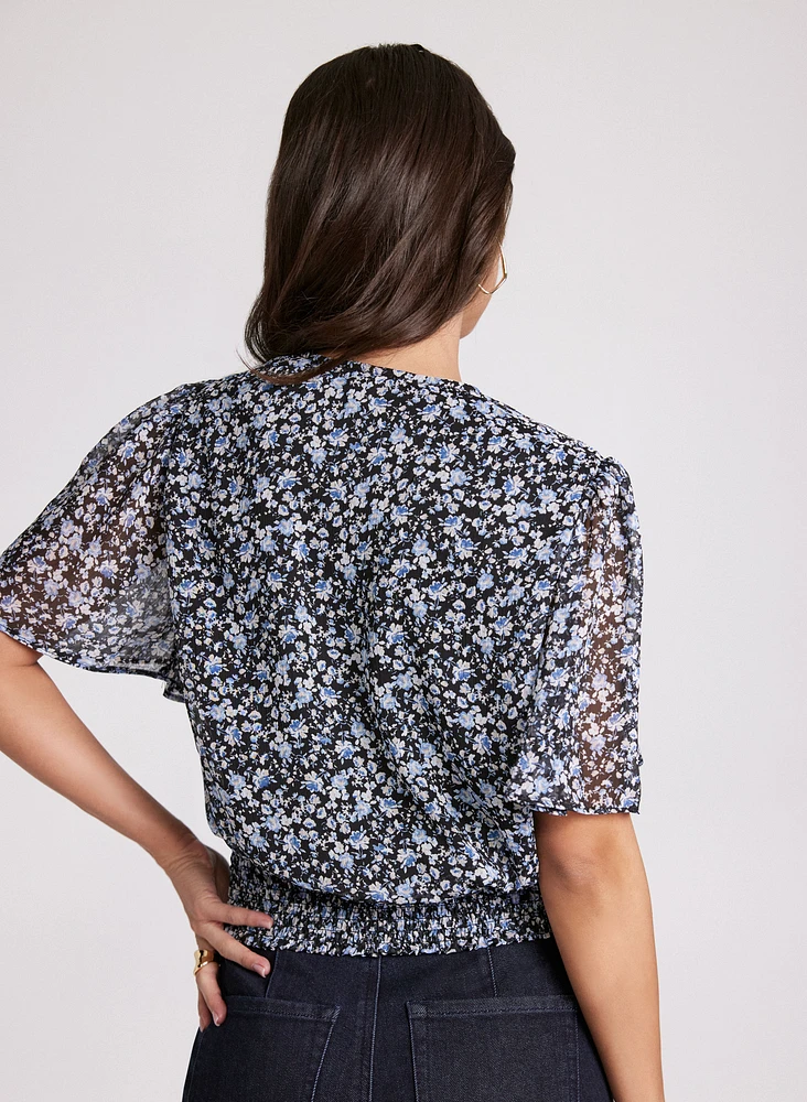 Blouse florale à manches évasées