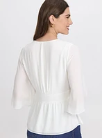 Blouse boutonnée à manches évasées