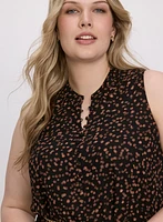 Robe à pois ceinture en chaine