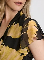 Blouse florale à encolure nouée