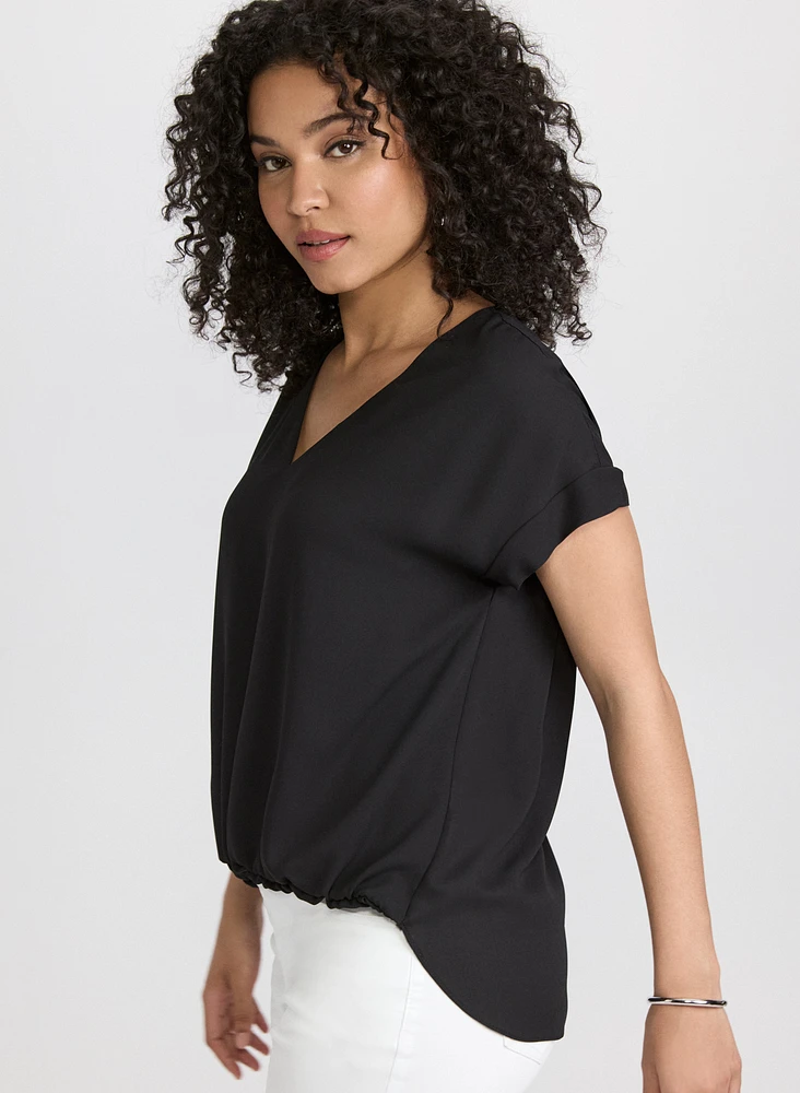 Blouse à ourlet bullé